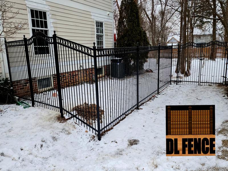 Long stretch of aluminum fence with decorative rings in Fishers, Indiana