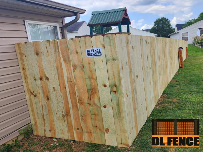 Rear view of a Camby wood privacy fence installation