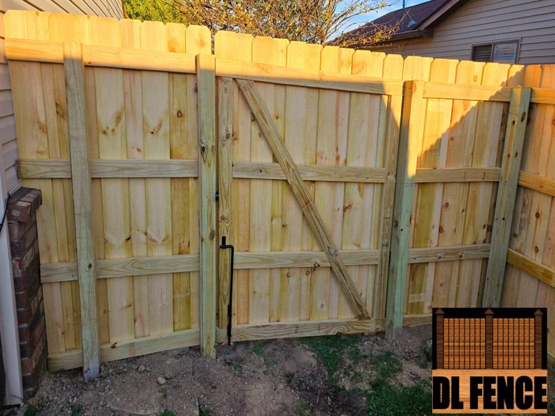 Tall wooden privacy fence installation in Mooresville, IN