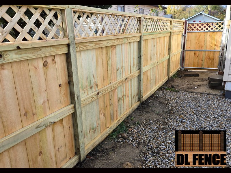 Clean-lined wood privacy fencing with lattice upper design, perfect for suburban yards in Indiana – 800x600