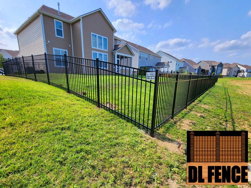 Alt Text/Description: Sleek aluminum fencing professionally installed by DL Fence around a large Indianapolis residential lot – 800x600